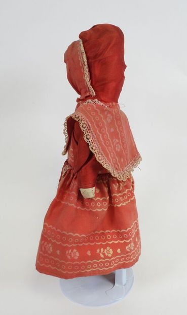 Fabric doll with boiled cardboard head.
Cloth...