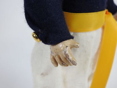 Little doll with bisque head, fixed eyes,...