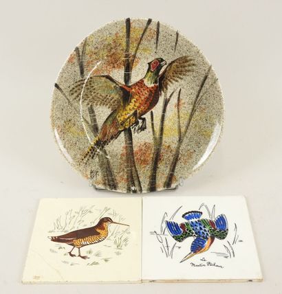 Assiette en faïence à décor d'un faisan.
Diam.:...