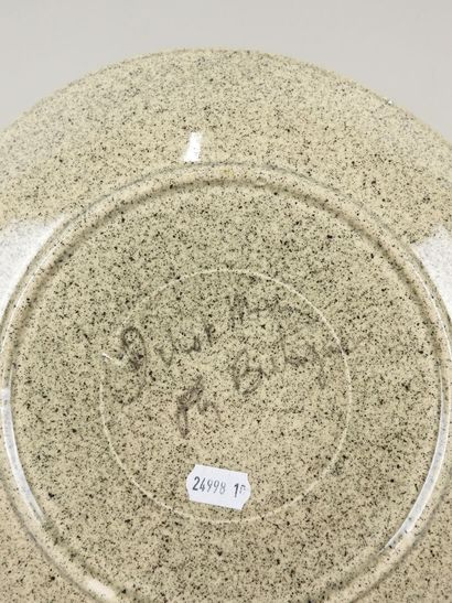 Assiette en faïence à décor d'un faisan.
Diam.:...