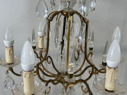Lustre en pampilles de cristal et bronze...