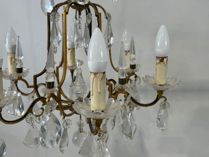 Lustre en pampilles de cristal et bronze...