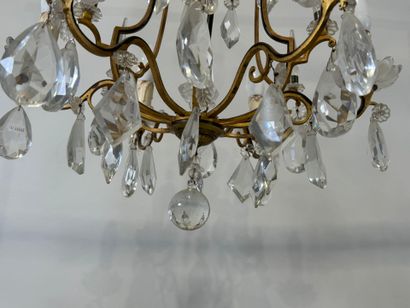 Lustre en pampilles de cristal et bronze...