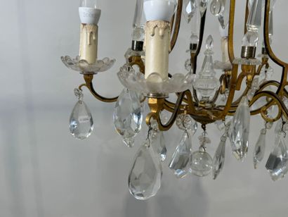 Lustre en pampilles de cristal et bronze...