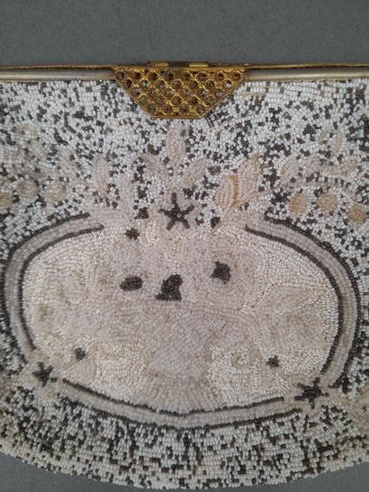 Clutch decorated with a bouquet of flowers...