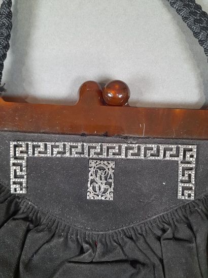 Evening bag in black suede adorned with a...