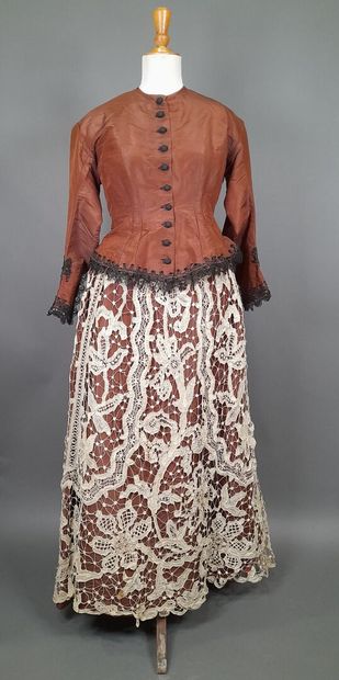 Brown fluted silk ensemble including a bodice...