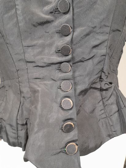 Set of two black fluted silk whalebone bodices,...