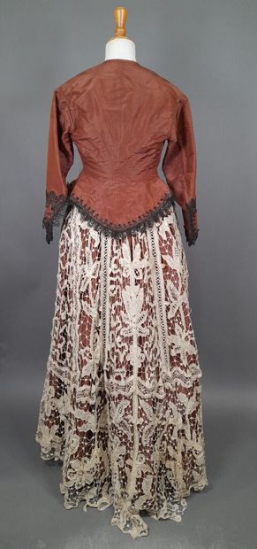 Brown fluted silk ensemble including a bodice...