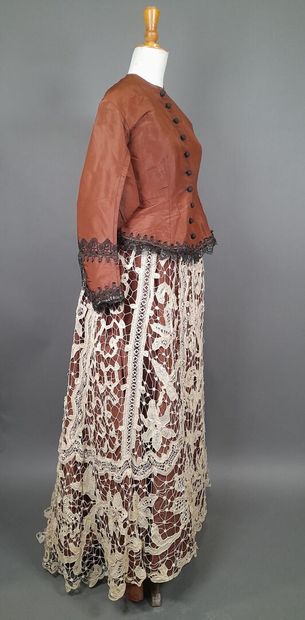 Brown fluted silk ensemble including a bodice...