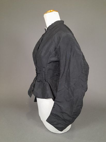 Set of two black fluted silk whalebone bodices,...