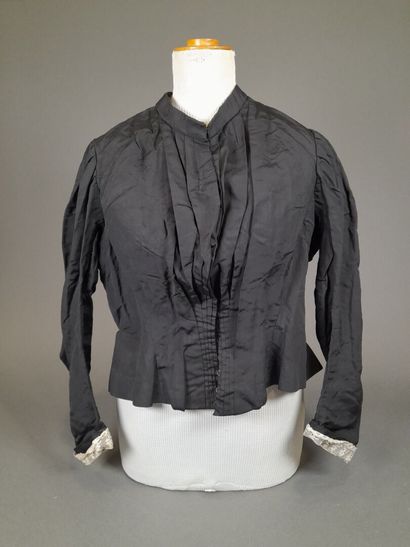 Set of two black fluted silk whalebone bodices,...