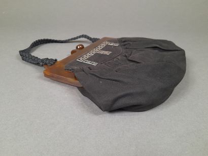Evening bag in black suede adorned with a...