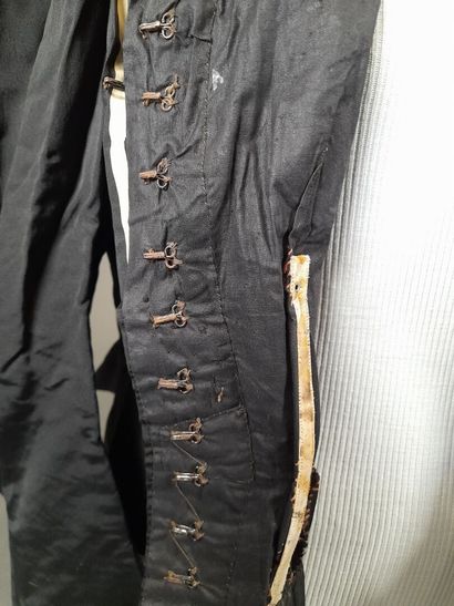 Set of two black fluted silk whalebone bodices,...