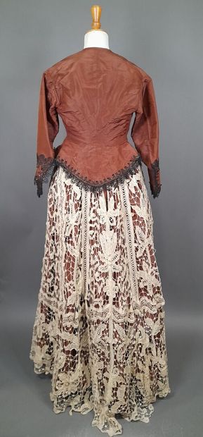 Brown fluted silk ensemble including a bodice...