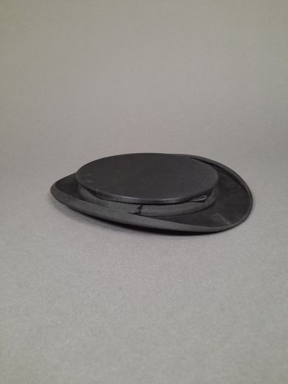 Black satin hat adorned with matching grosgrain...