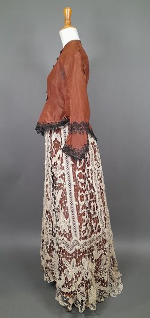 Brown fluted silk ensemble including a bodice...