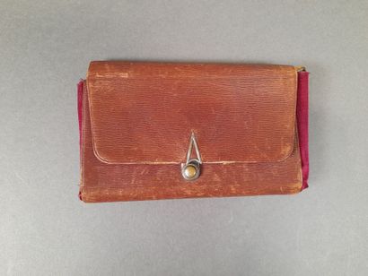 Epi embossed brown leather travel set, red...