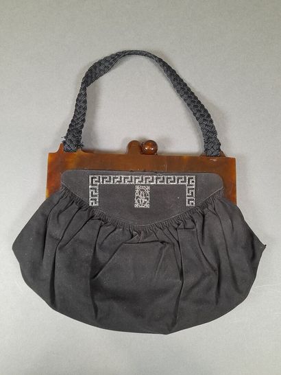Evening bag in black suede adorned with a...