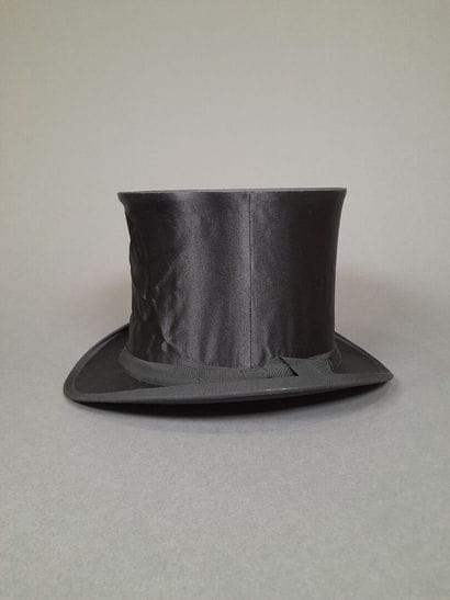 Black satin hat with matching grosgrain ribbon....