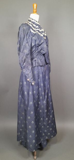 Set in shaped silk decorated with blue and...