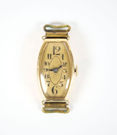 18K yellow gold tonneau-shaped lady's wristwatch...
