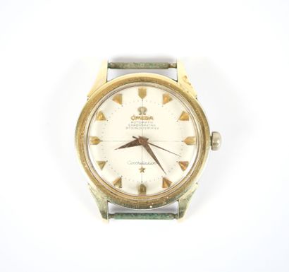 OMEGA. 
Steel and gilt metal men's wristwatch...