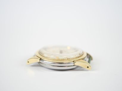 OMEGA. 
Steel and gilt metal men's wristwatch...