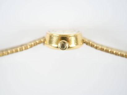 OMEGA.
Ladies' watch, circular case and stylized...