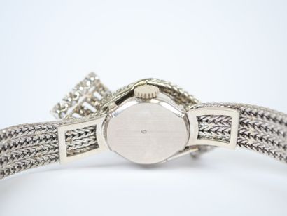 UTI.
Ladies' jewelry watch, 18K white gold...