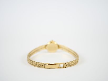 OMEGA.
Ladies' watch, circular case and stylized...