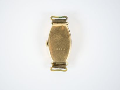 18K yellow gold tonneau-shaped lady's wristwatch...