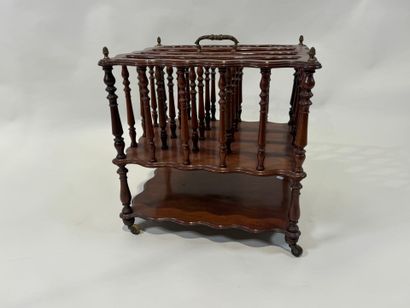 Mahogany magazine rack with openwork bars...