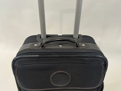 LANCEL. 
Travel suitcase or handbag on wheels...
