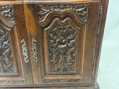 Molded and carved wooden sideboard opening...