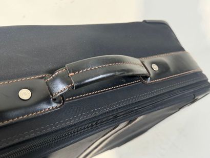 LANCEL. 
Travel suitcase or handbag on wheels...