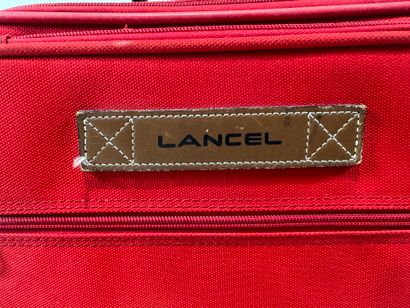 LANCEL.
Travel or hand luggage on wheels...