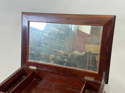Small mahogany workbench opening with a flap...