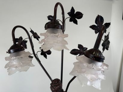 Three-armed resin lamp depicting a woman...