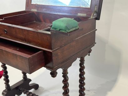 Small mahogany workbench opening with a flap...