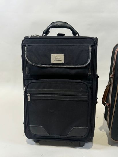 LANCEL.
Black canvas and leather travel case...