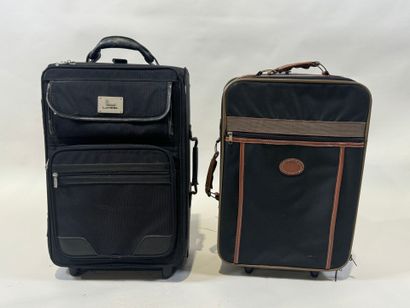 LANCEL.
Black canvas and leather travel case...