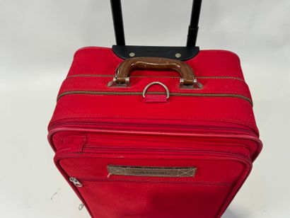 LANCEL.
Travel or hand luggage on wheels...