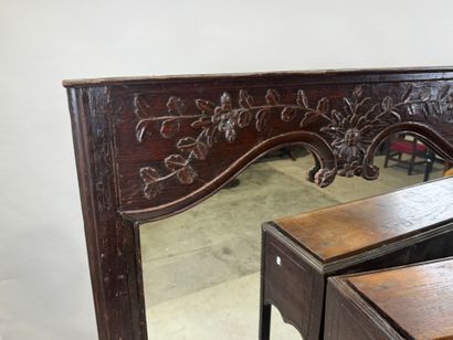 Molded and carved walnut console and mirror...
