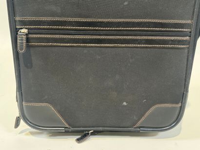 LANCEL. 
Travel suitcase or handbag on wheels...