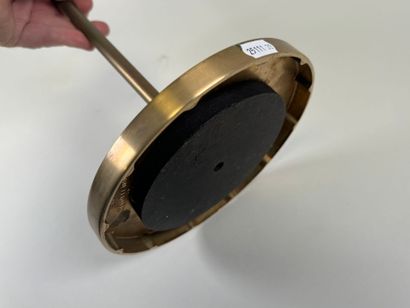 Salon ashtray in gilt metal, circular base.
H....