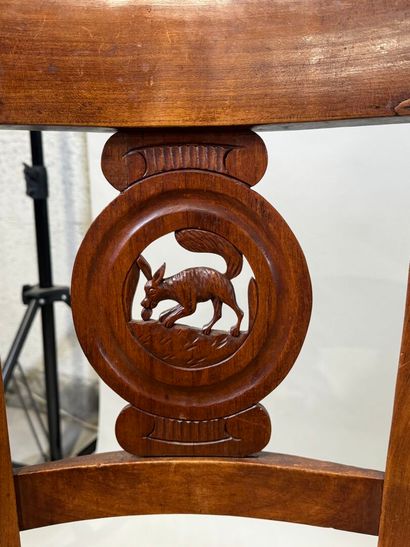 Two pairs of walnut chairs, straw-bottomed...