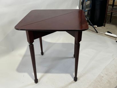Triangular console table in molded mahogany,...