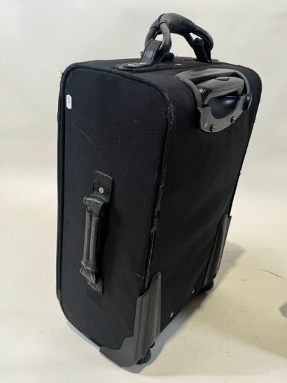 LANCEL.
Black canvas and leather travel case...