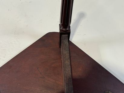Triangular console table in molded mahogany,...